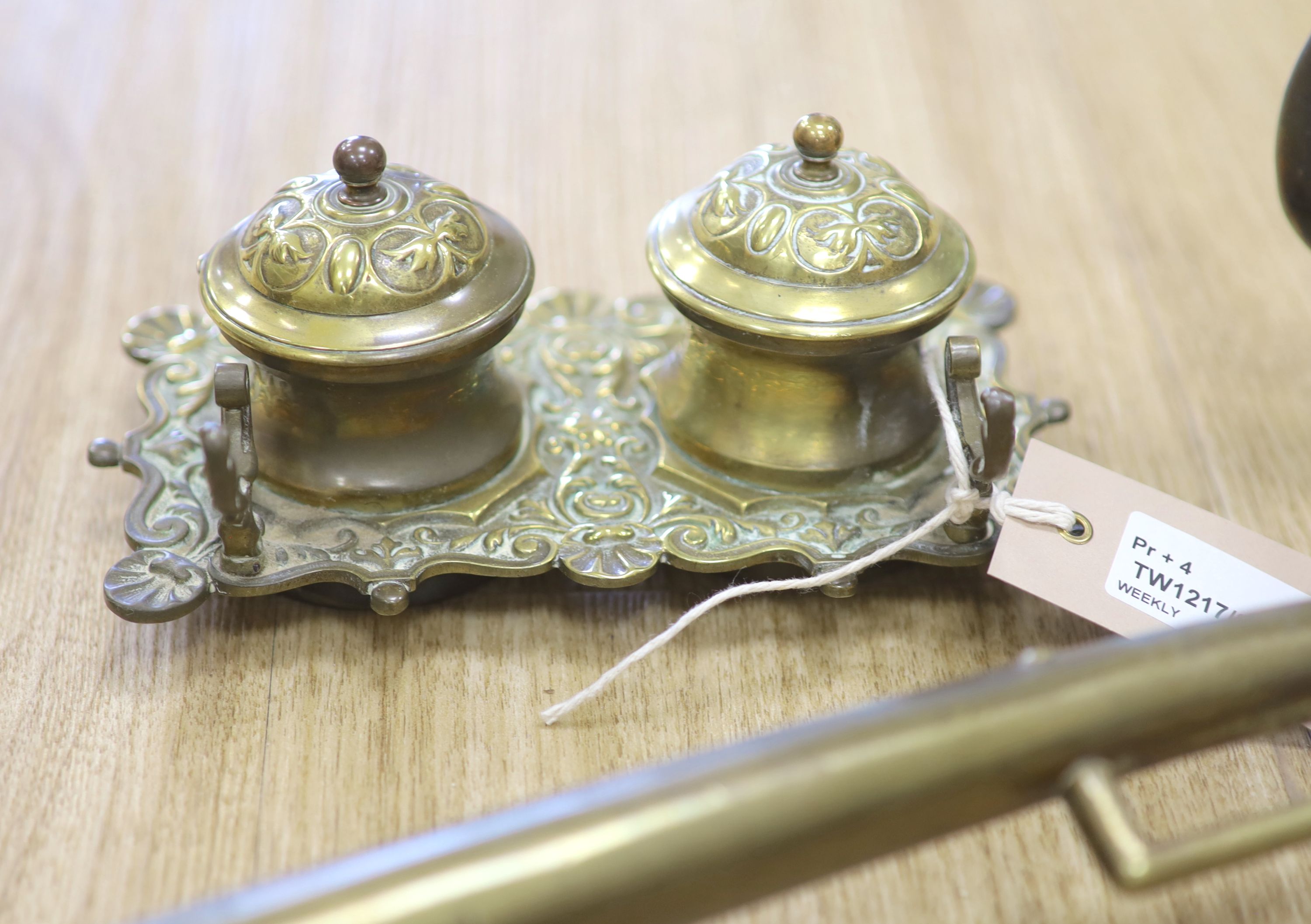 A pair of brass hames, a brass deskstand, a small copper kettle, a small brass and copper jardiniere and a pot stand